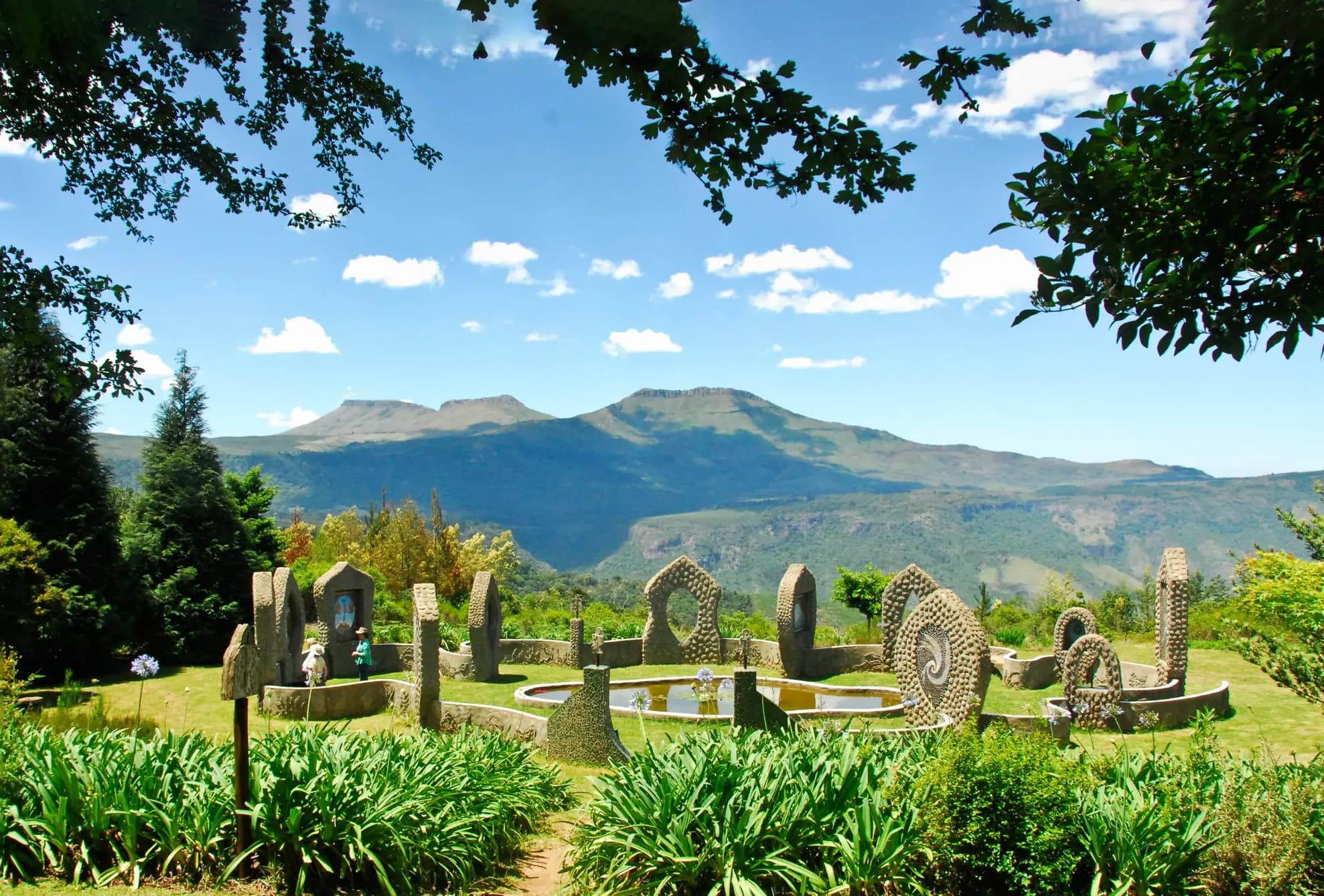 Art in a Hogsback garden with the Amathole Mountains beyond