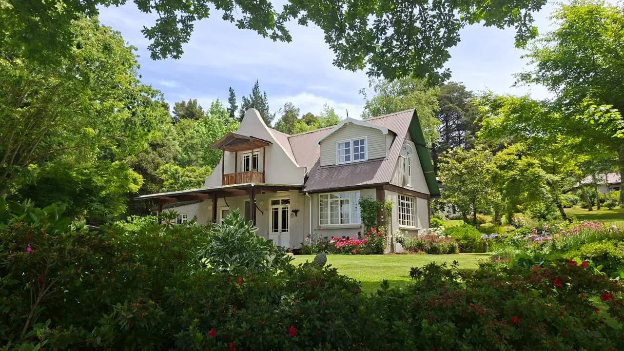 A storybook house surrounded by the Bramber garden